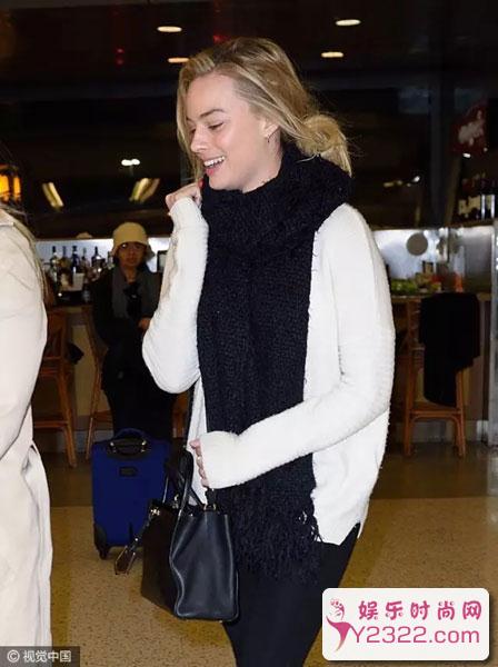 冬天围围巾搭配什么发型才最美 5种方法让你美美出门_Y2OOO.COM第7张